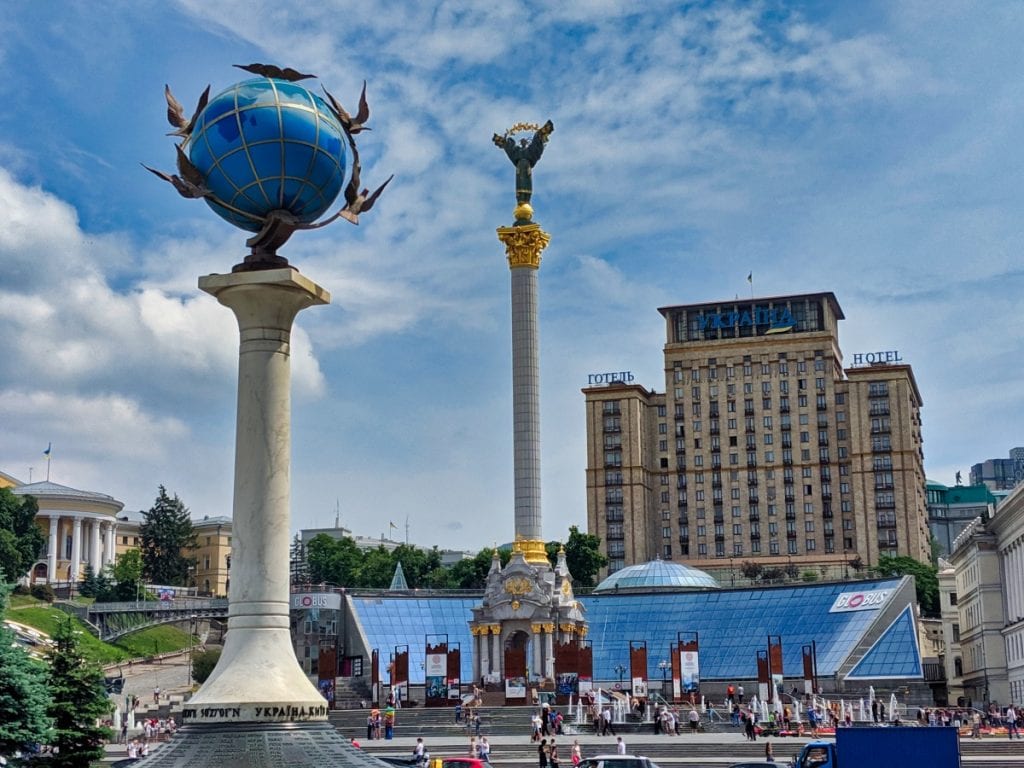 Independence Monument And Kilometer Zero Sign Maidan Square Kyiv