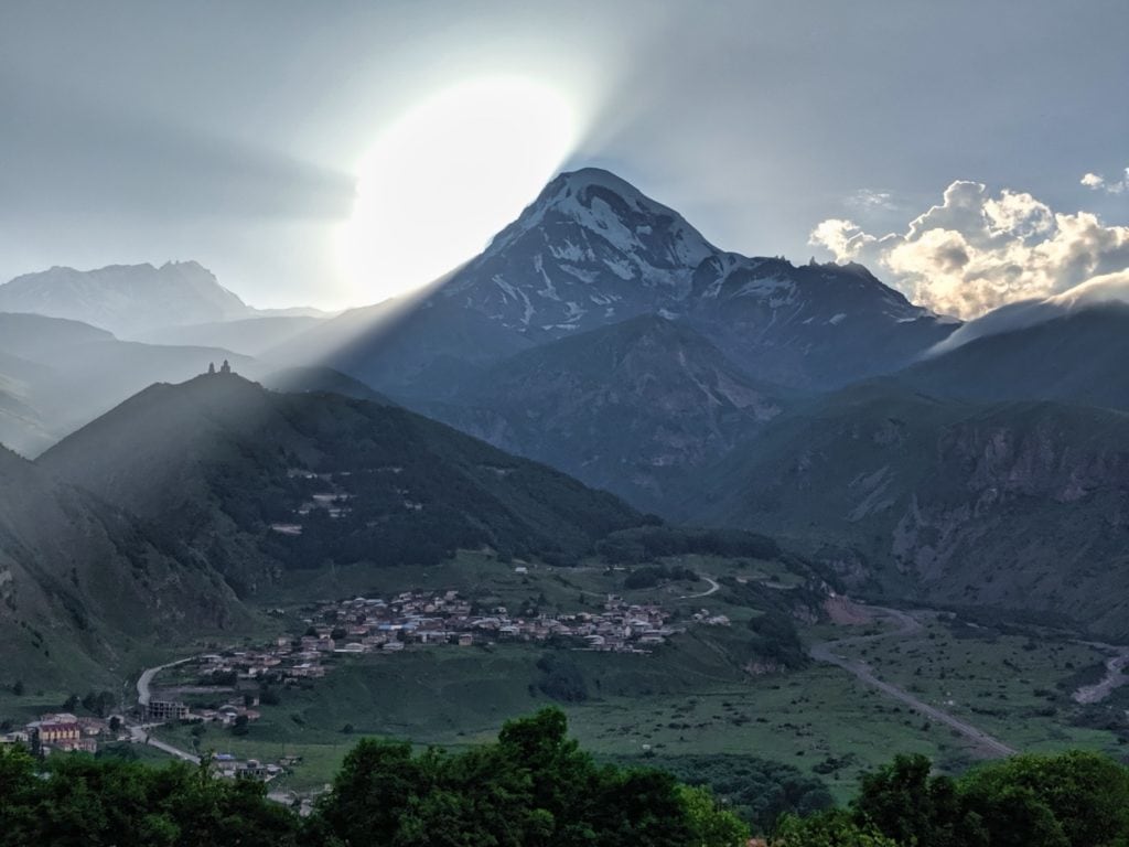 gergeti church with mt kazbek sunset