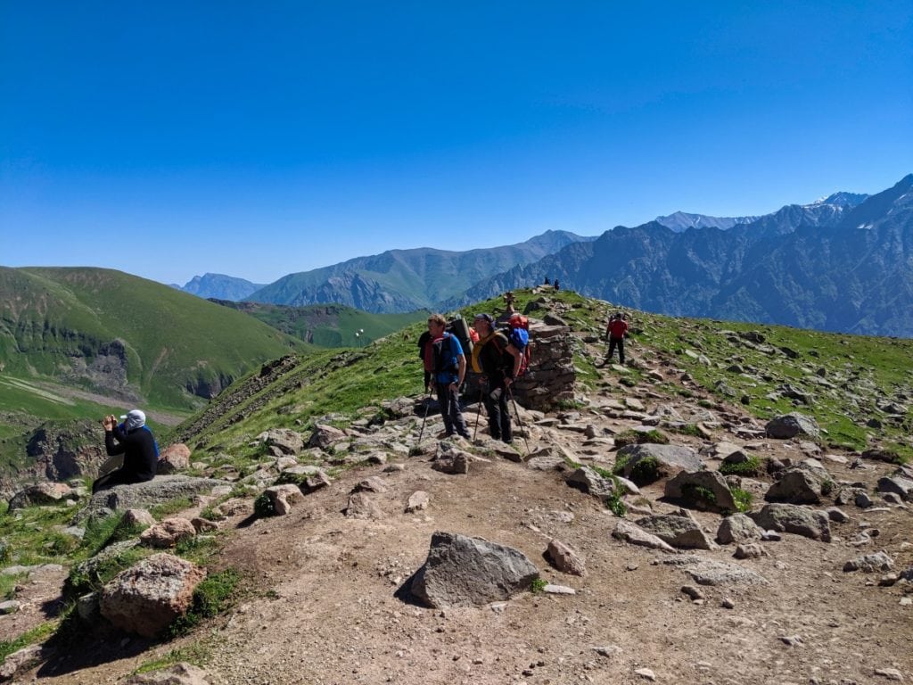 hikers on ridge on trail