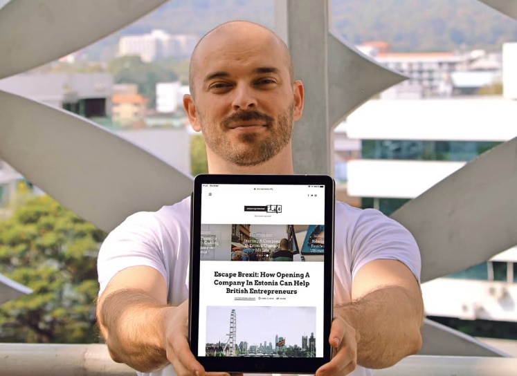 Micropreneur Ignacio with his guide for digital nomads